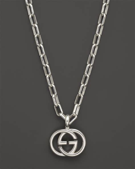 gucci logo necklace gold|Gucci interlocking g pendant necklace.